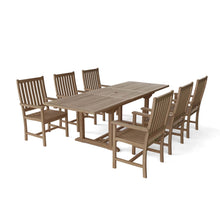 Elegant 7-Piece Extension Dining Set in Teak, Table Can Seat Up To 10 Via Leaf Extension - 6 Chairs Included.