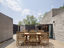 Elegant 7-Piece Extension Dining Set in Teak, Table Can Seat Up To 10 Via Leaf Extension - 6 Chairs Included.