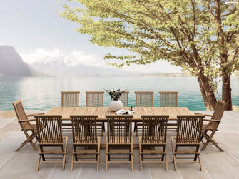 Toast With Friends & Family & This 13-Piece Teak Dining Set, Seats 12 & Turns Your Patio Into a Memorable Alcove.